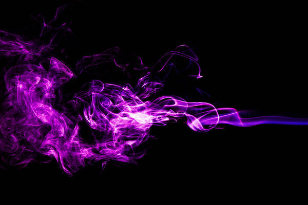 Purple smoke on a black background. Beautiful background