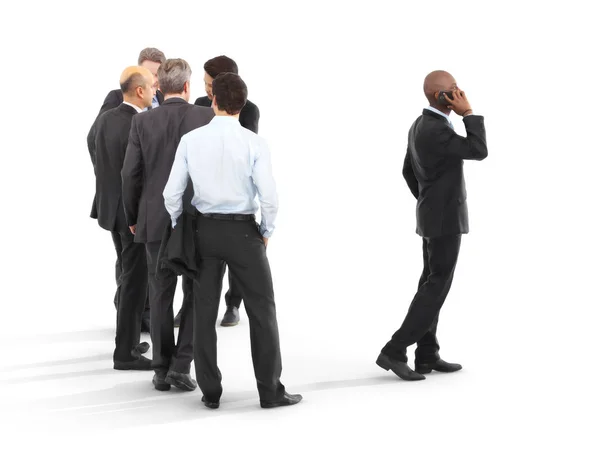 Gruppe von Geschäftsleuten, von denen einer an die Front aufrückt. Führung, Führung, Leistung, Initiative oder Minderheitenkonzept auf weißem, isoliertem Hintergrund. — Stockfoto