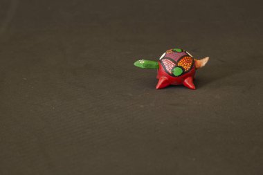 Red wooden turtle made of Mexican handicraft