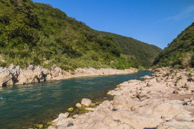 Amazing crystalline blue water of Tamul waterfall, Close up view of spectacular Tamul River,at Huasteca Potosina in San Luis Potosi, Mexico
