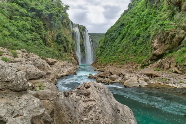 Green Background Scenic view of spectacular Tamul Waterfall, Tampaon River, Huasteca Potosina, Mexico