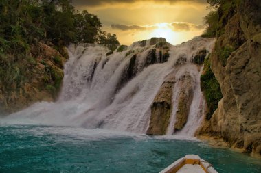 Unbelievable summer morning scene on the Waterfall (EL SALTO-EL MECO) san luis potosi Mexico,Colorful sunrise . Beauty of nature concept background.