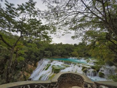 Man over a waterfall ,(EL SALTO-EL MECO) san luis potosi México clipart