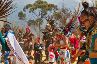 Sacromonte Amecameca - February 27, 2020: Aztec dancers dancing in the Parque nacional Sacromonte