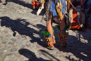 Sacromonte Amecameca - February 27, 2020: Aztec dancers dancing in the Parque nacional Sacromonte