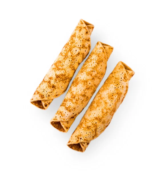 Heerlijke pannenkoeken gerold in een broodje — Stockfoto