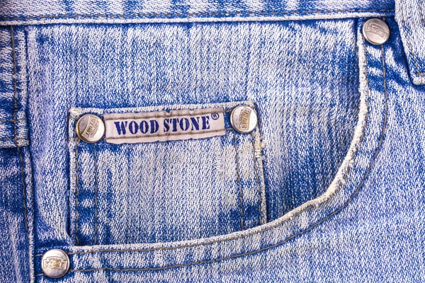 Fechar a textura das calças de ganga da WOOD STONE — Fotografia de Stock