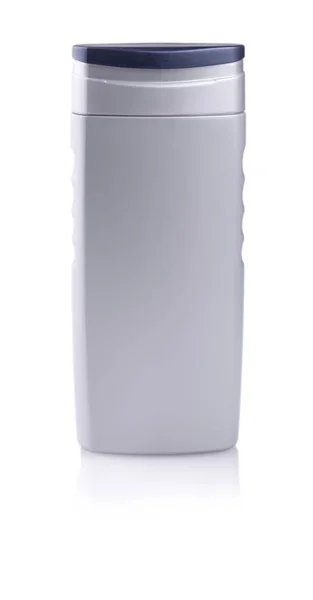 Botella gris de champú sobre blanco —  Fotos de Stock