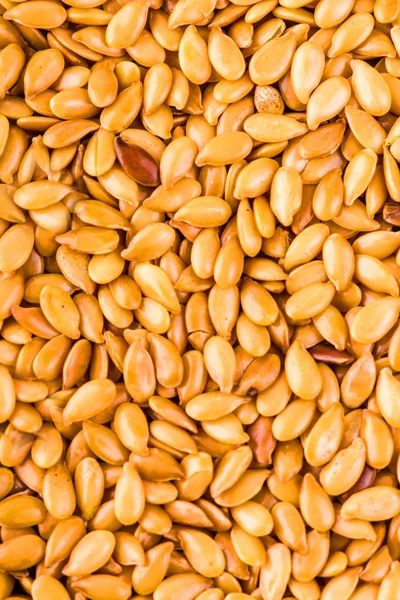 Textura de semillas de lino dorado tostadas o de linaza —  Fotos de Stock