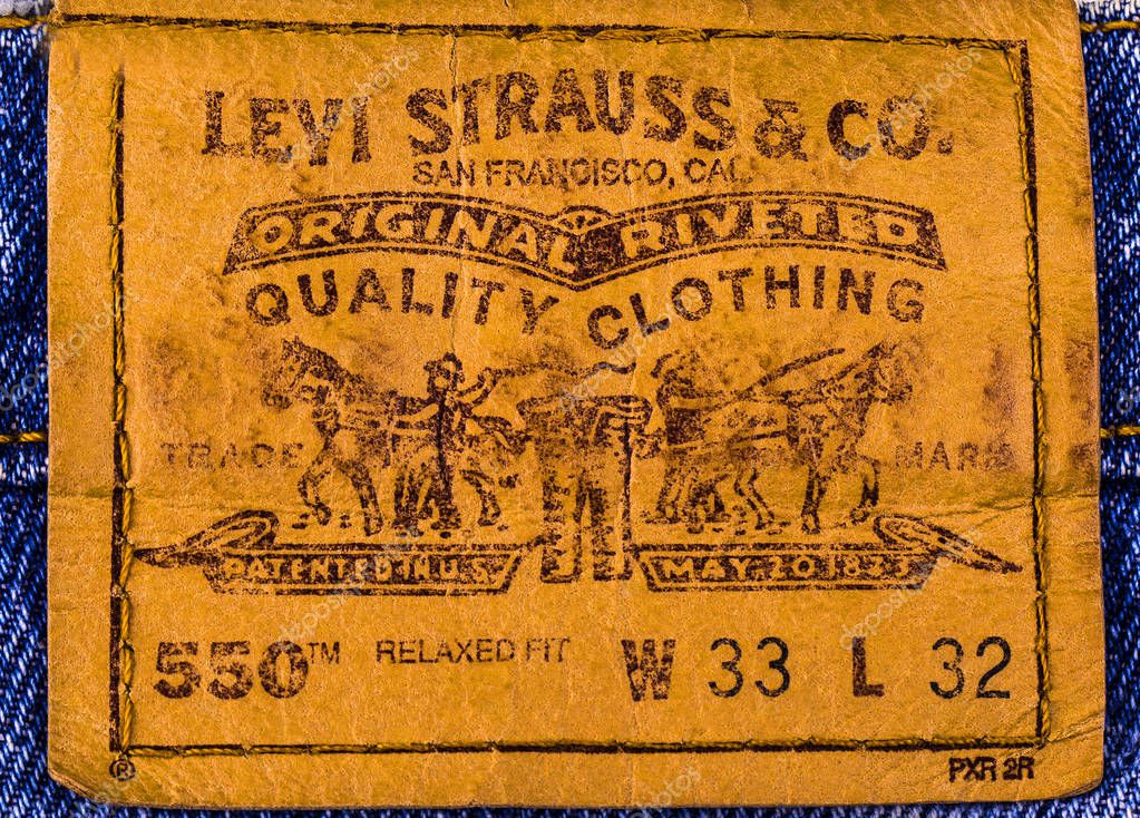 Chisinau, Moldova February 10, 2017: Close up of the LEVI'S leather label on the blue jeans. Retro style toned image. LEVI'S is a brand name of Levi Strauss and Co, founded in 1853