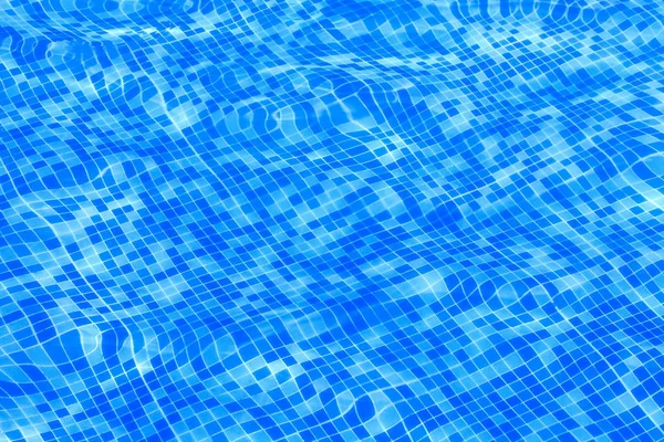 Blue ripped water in swimming pool background. — Stock Photo, Image