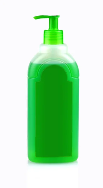 Green bottle with shampoo with dispenser — Stock Photo, Image