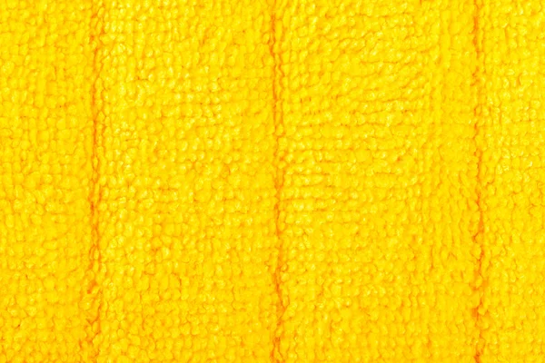 Texture d'une serviette en tissu jaune . — Photo