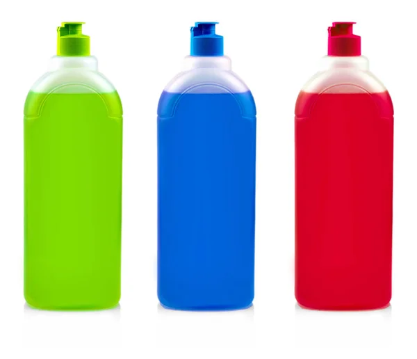 Botellas de color árbol con detergente lavavajillas en blanco —  Fotos de Stock