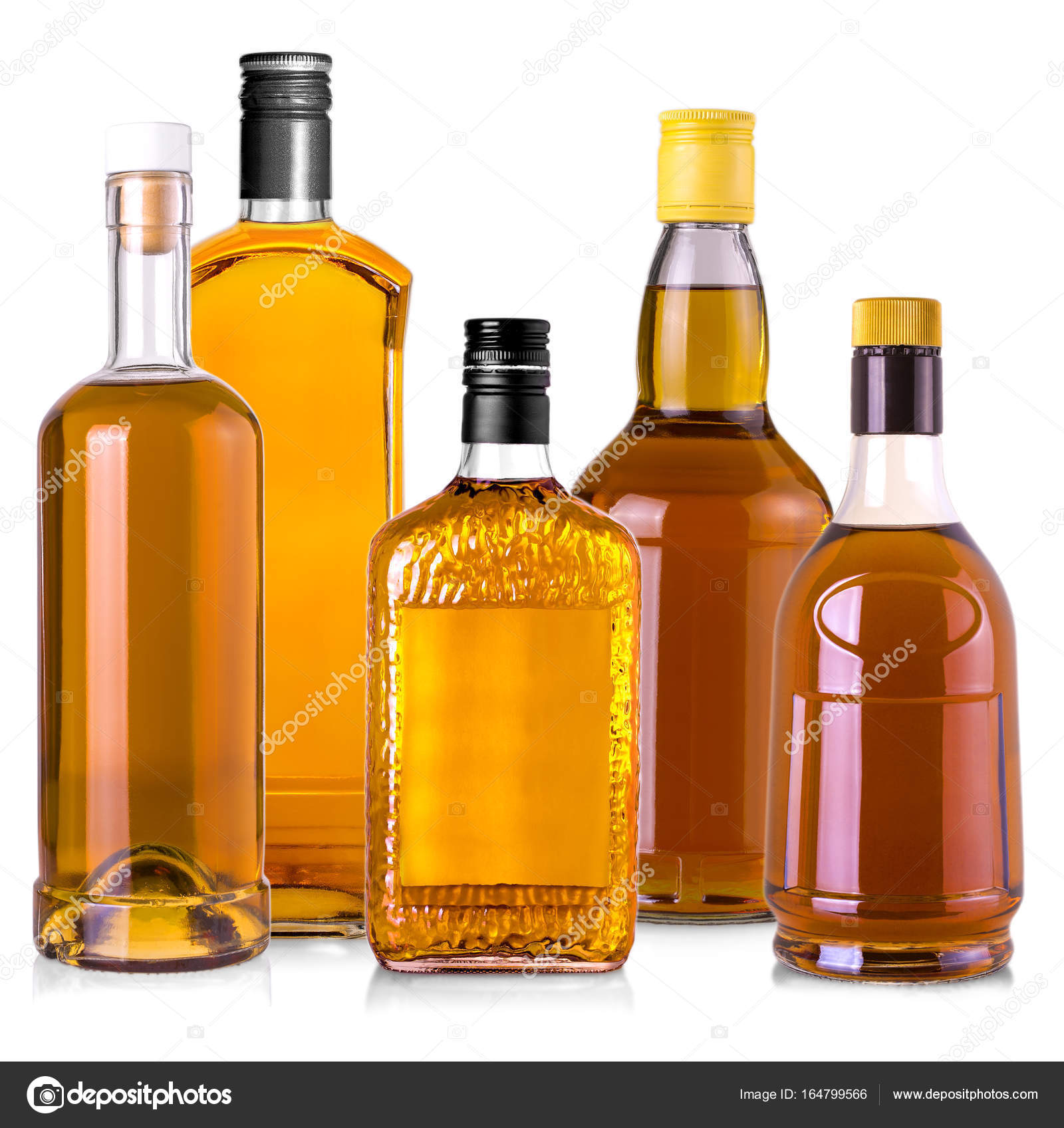 Set of Beautiful Whiskey Bottles against well lit background. Stock