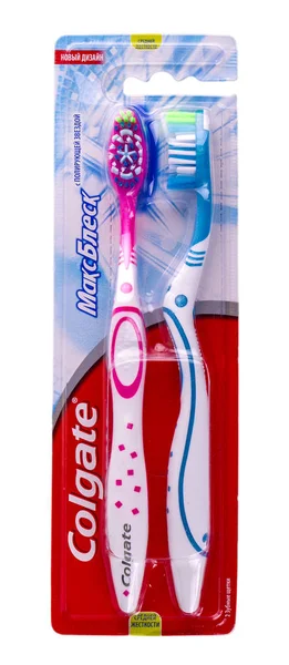 Colgate Zahnbürsten auf weiß. — Stockfoto
