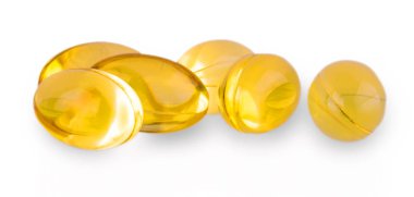 Beyaz zemin üzerine sarı renkli yumuşak jelatin kapsül 