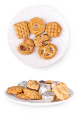 Kurabiyeyle beyaz arka plan üzerinde beyaz tabak.