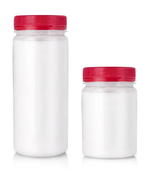 White jar with red cap without label on a white background. — Stock Photo, Image