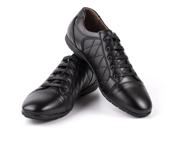 Czarne skórzane boty na białym tle — Zdjęcie stockowe