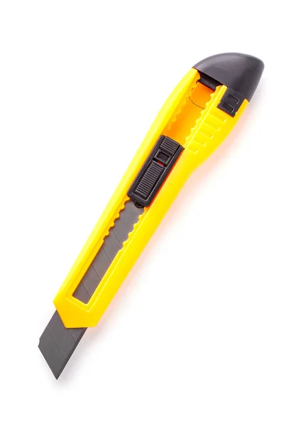 Gelbes Schreibwarenmesser isoliert auf weißem Hintergrund — Stockfoto