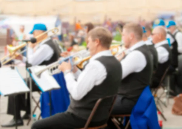 Městský instrumentální orchestr rozmazaný jako pozadí — Stock fotografie