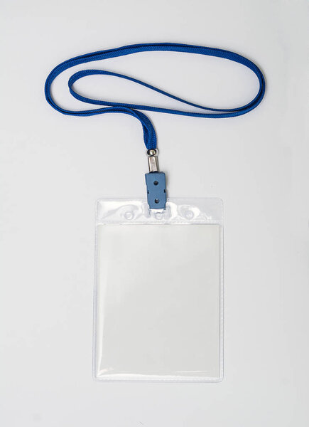Lanyard and badge. Conference badge. Blank badge template in plastic holder with blue strap.