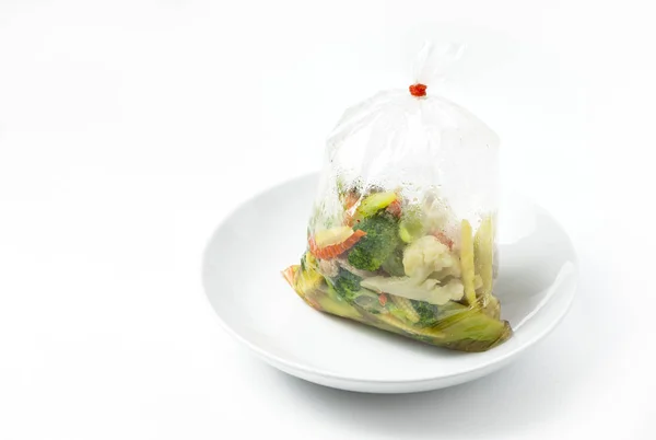 Thais eten stired gebakken mix groente in plastic zak — Stockfoto