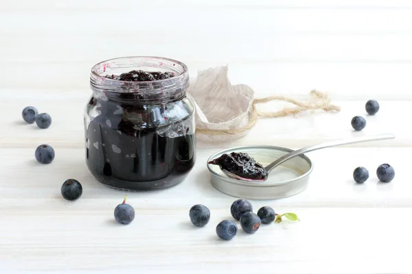 Open Jar Berry Jam Small Spoon Background Blueberries — Stock Photo, Image