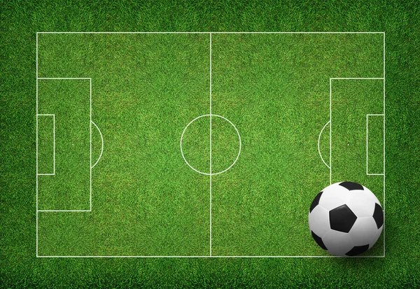 Voetbal op groene gras van voetbalveld. — Stockfoto