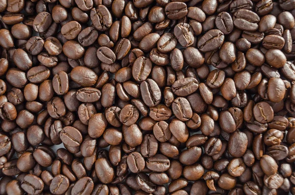 Rostade kaffebönor bakgrund. — Stockfoto