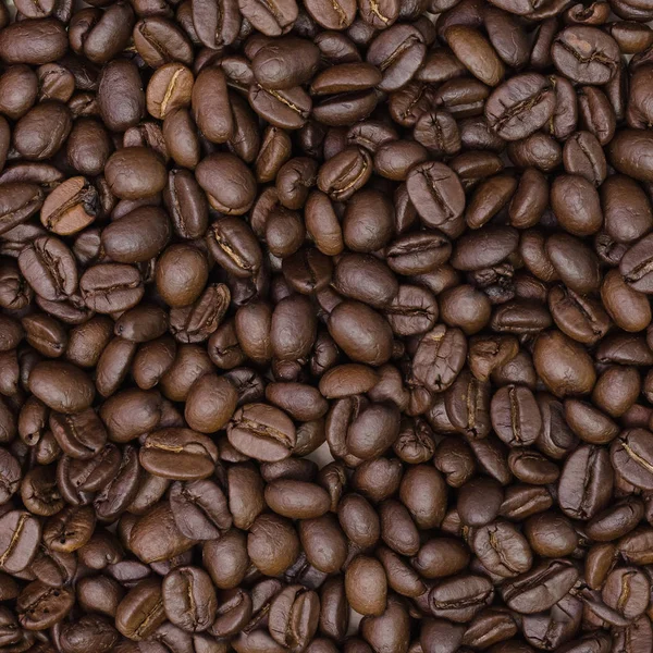 Φρυγμένους κόκκους καφέ. Γκρο πλαν, κόκκους καφέ για το φόντο. — Φωτογραφία Αρχείου