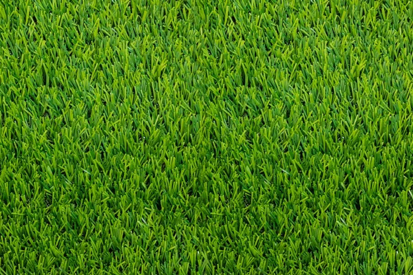 Pohled shora umělé zelené trávě textury pro golfové hřiště backg — Stock fotografie