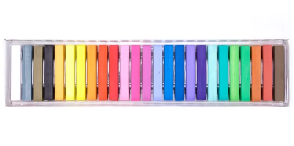 Bunch of square colorful pastel chalks in a box, on white background — Stock Photo, Image