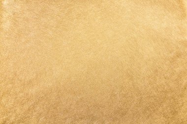 Soyut altın kumaş doku / arka plan.