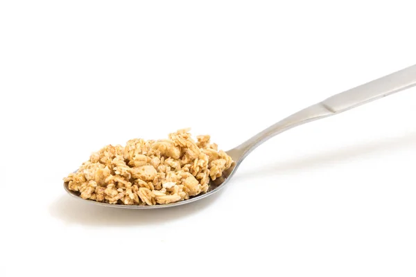 Colher com granola, sobre fundo branco . — Fotografia de Stock