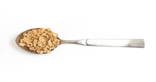 Lepel met muesli, op witte achtergrond. Rechtenvrije Stockafbeeldingen