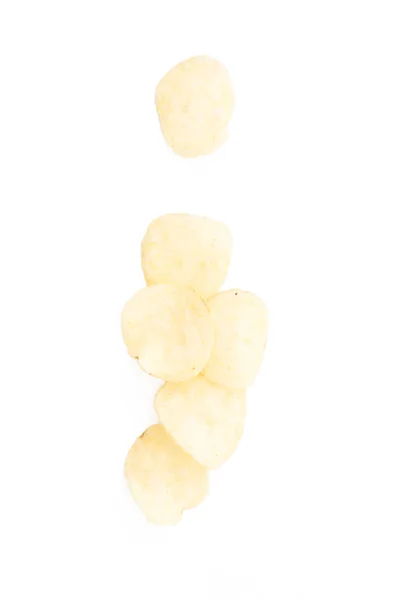 Crispy thinly sliced potato chips, on white background. — Stock Photo, Image