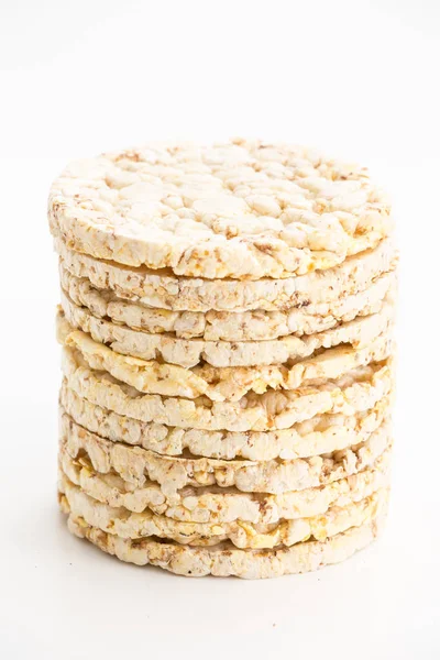Round corn cakes/ crackers, on white background.