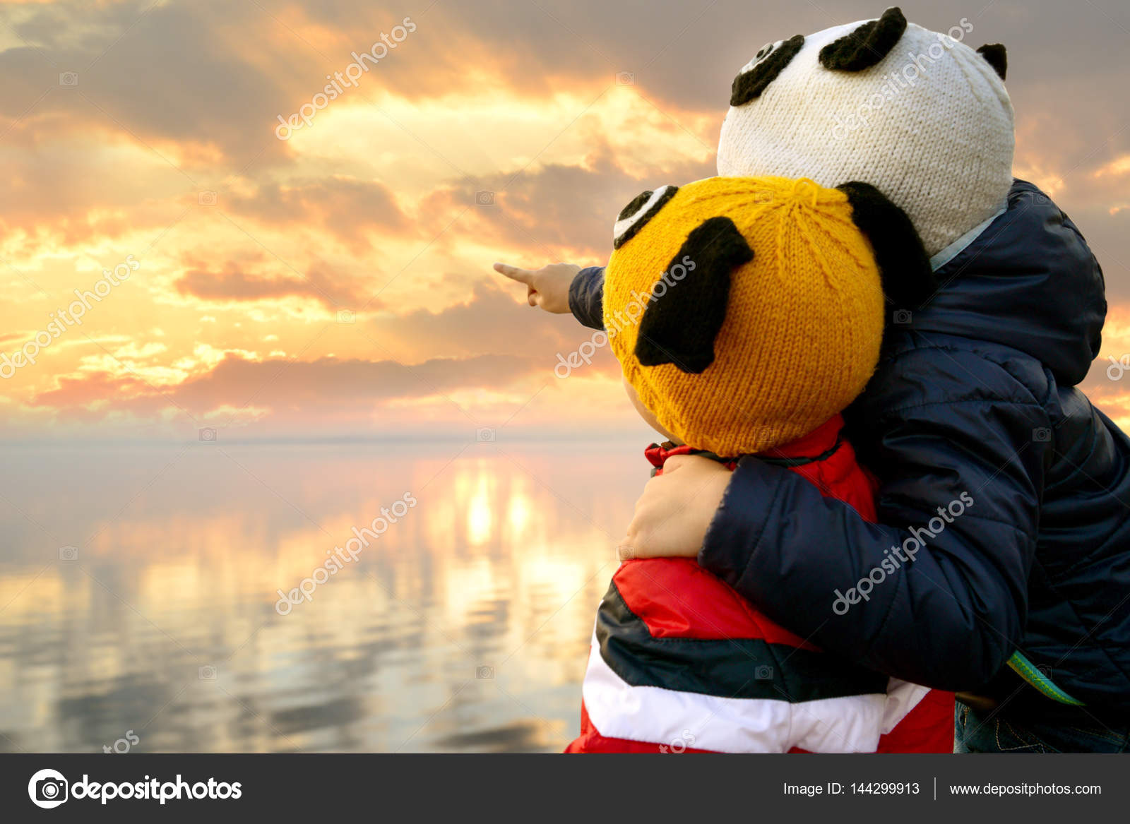 Two Brothers On The Promenade Arm In Arm Looking Out Over The Sea Sunset Stock Photo Image By C Koltsovthebest Two Brothers On The Promenade Arm In Arm Looking Out Over The Sea Sunset Stock Photo Image By C Koltsovthebest