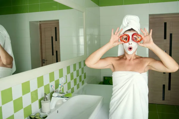 The woman makes a face mask after shower in the morning.Beauty treatments for the skin