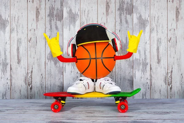 The concept of the sports and music Hip hop style .Basketball ball, headphones,fashionable cap, sneakers and skateboard.