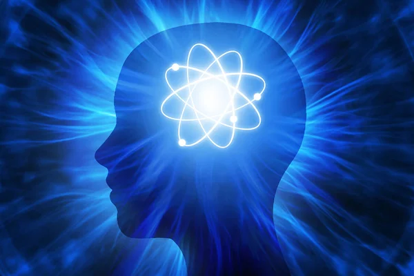 Человеческая голова с атомными лучами энергии — стоковое фото