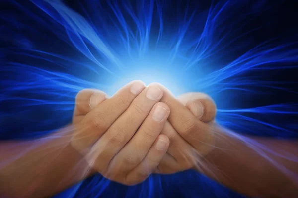 Hands with blue power rays — Stock Photo, Image