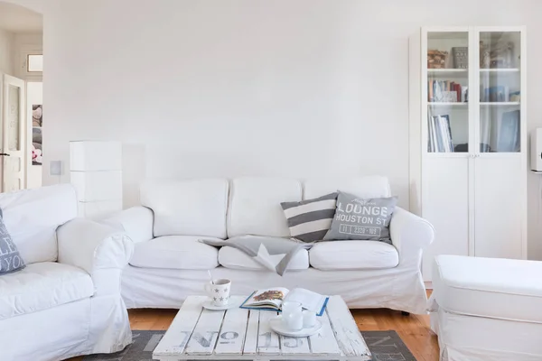 Living room in bright, white ambient.