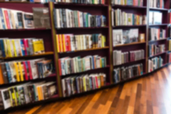 Bookstore blur background with miscellaneous books shelf — Stock Photo, Image