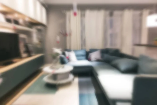 Abstract Blur background of modern living room furniture showroo