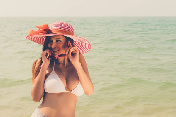Beautiful attractive large breast asian bikini woman posing sexy