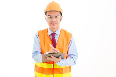 Kendine güvenen Asya delikanlı, turuncu Emanet şapka, turuncu Emanet jack