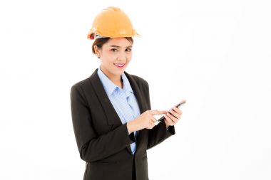 Genç emin Asyalı kadın, turuncu Emanet şapka, siyah takım elbise, mavi